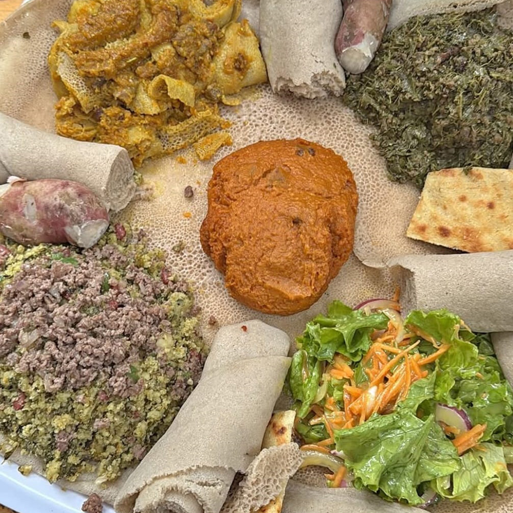 Beyaynetu shared platter on injera